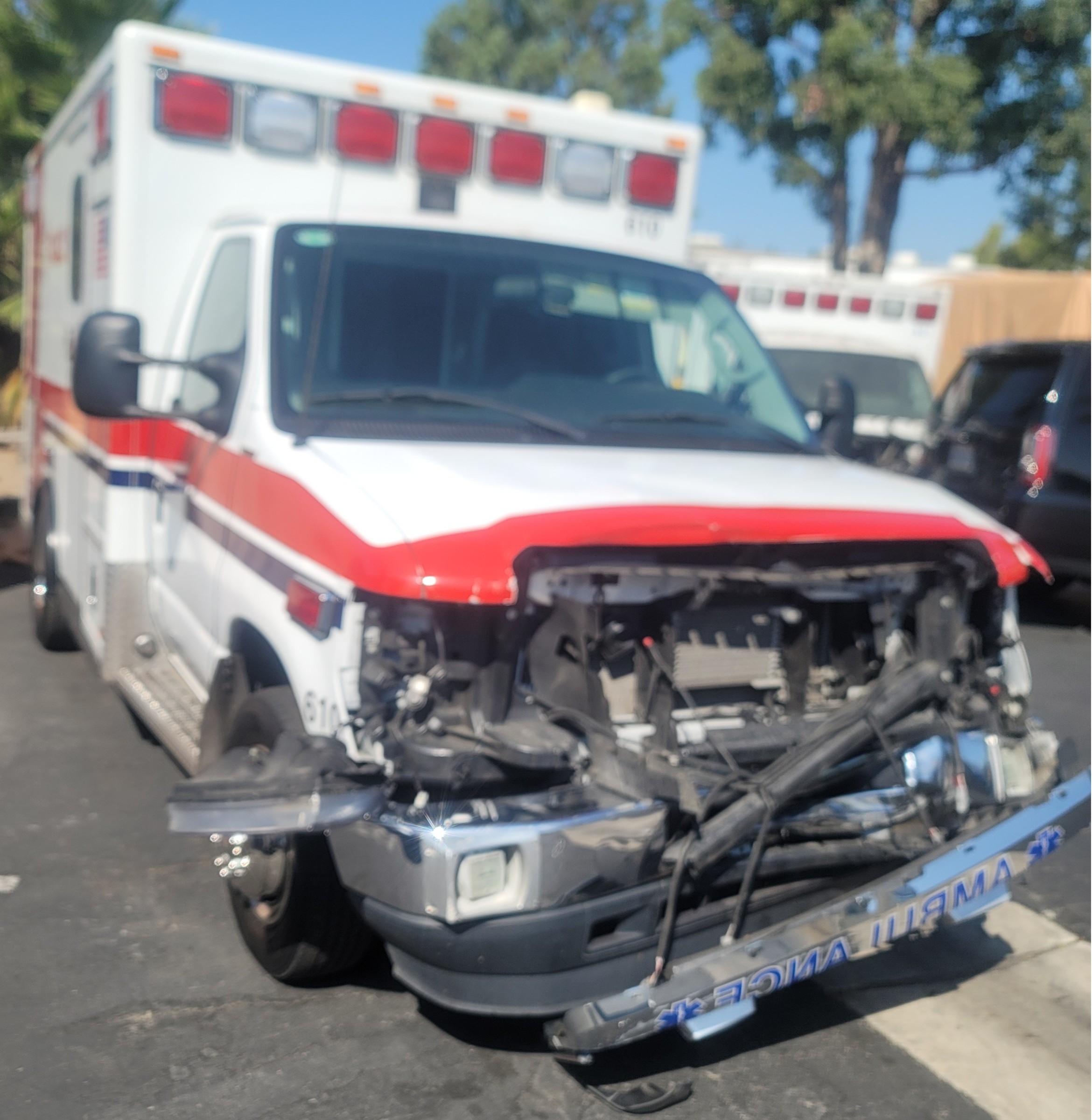 Ambulance with heavy front-end collision damage in for a full front clip rebuild