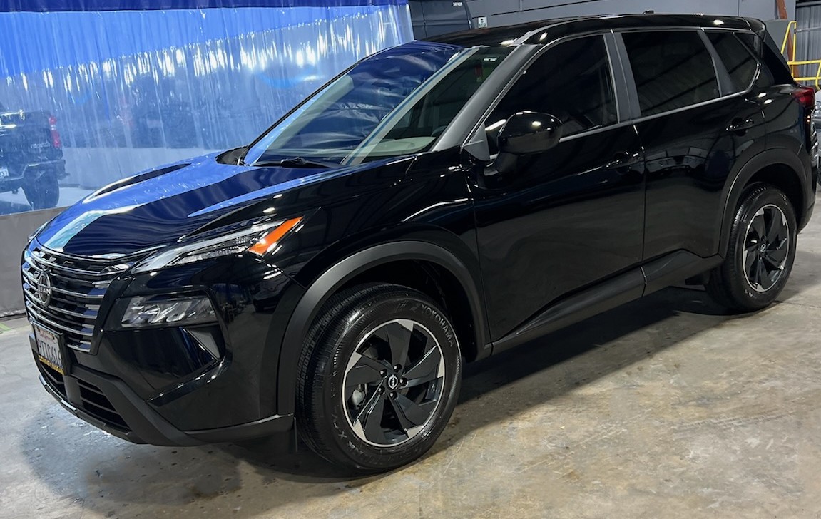 Refinished black Nissan Rogue SUV ready for delivery