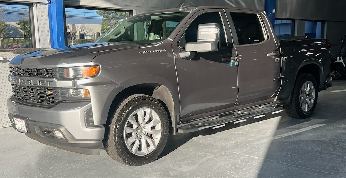 Refinished gray Chevrolet Silverado after collision repair at Key West