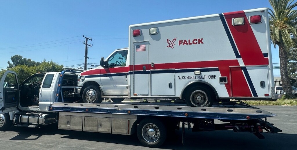 Falck Mobile Health ambulance transported for repair at Key West